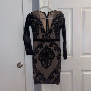 Used black long sleeve dress. Great condition